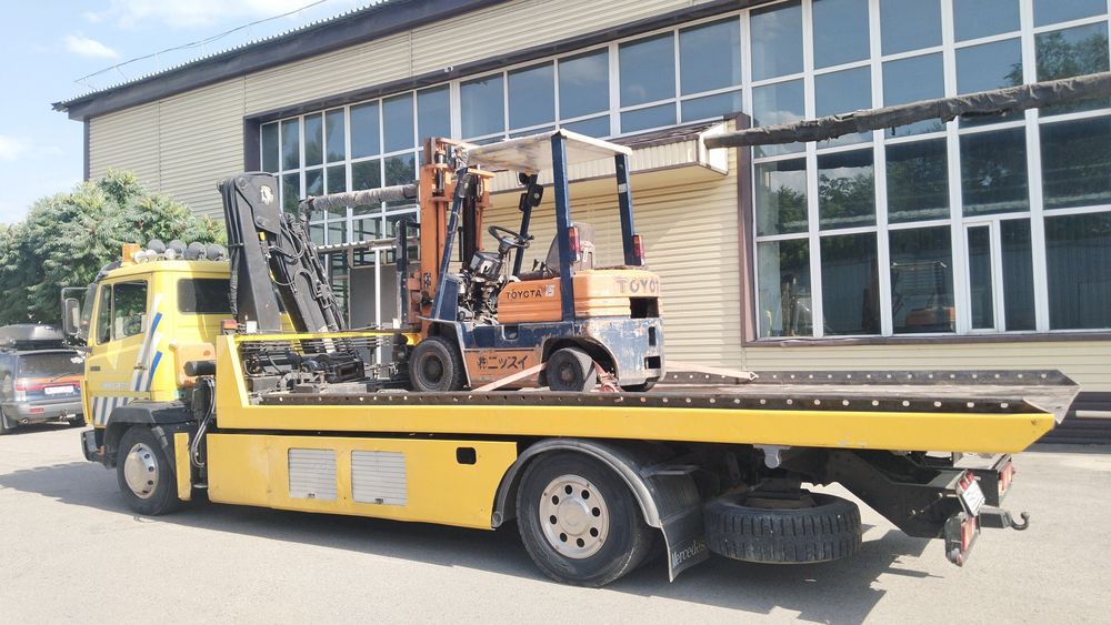 Эвакуатор, манипулятор сиежающий платформе.