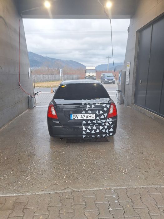Vand sau schimb chevrolet lacetti