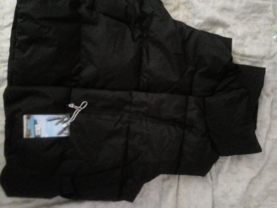 Продам жилетку новую