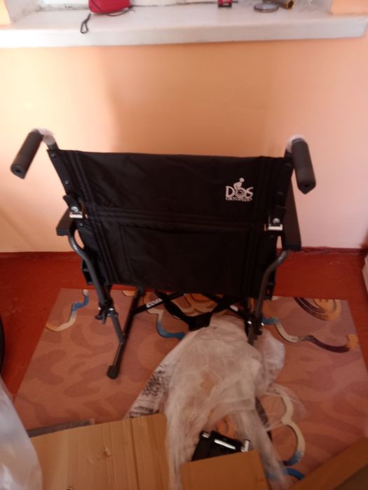 Механическая коляска