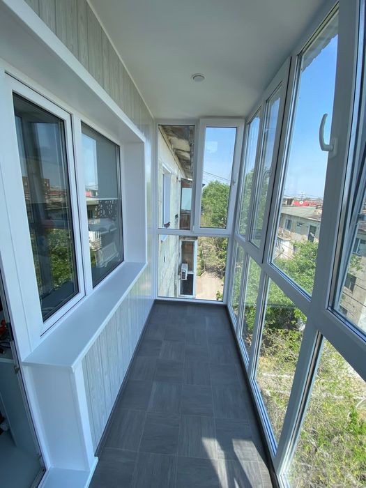 Пластиковые окна балконы