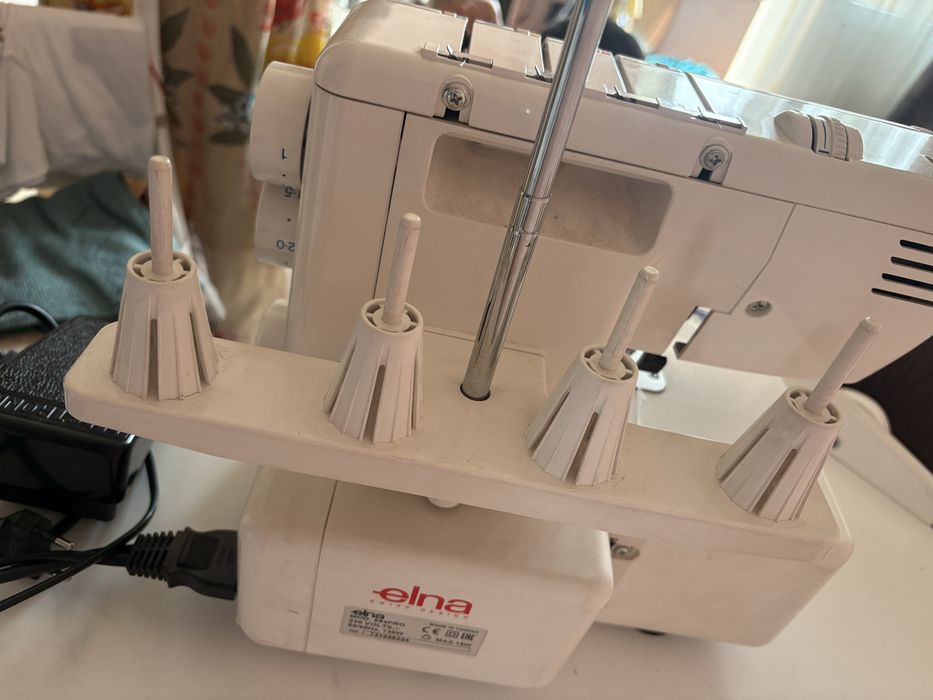 Janome оверлок elna