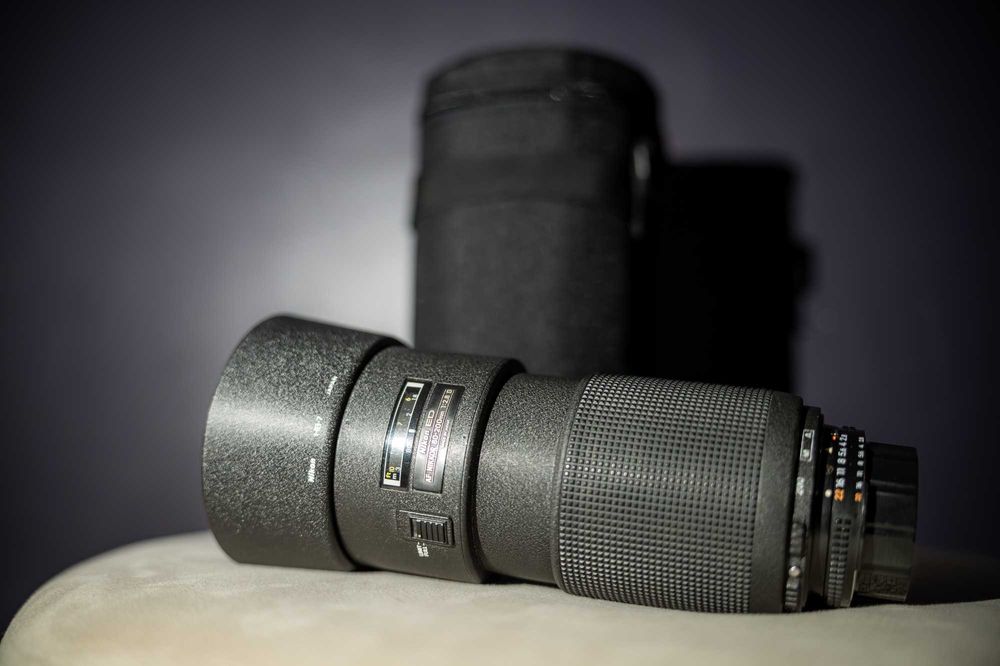 Nikon AF 80-200mm f/2.8 – stare excelentă + filtru de protecție Bower
