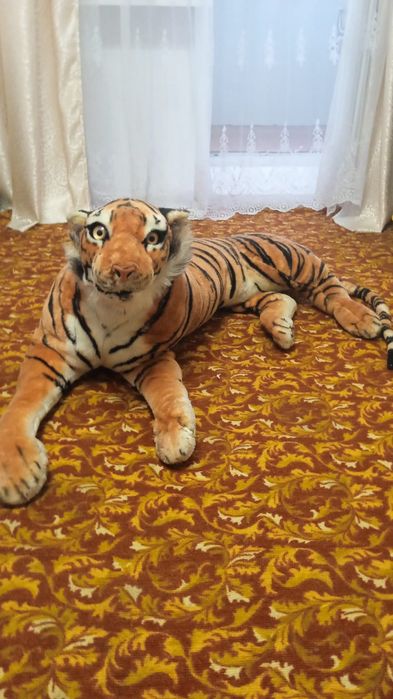 Продам игрушку тигр
