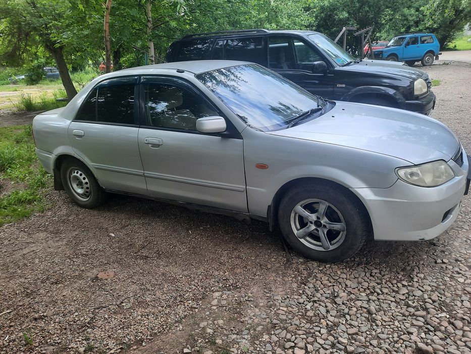 Машина мазда фамилия