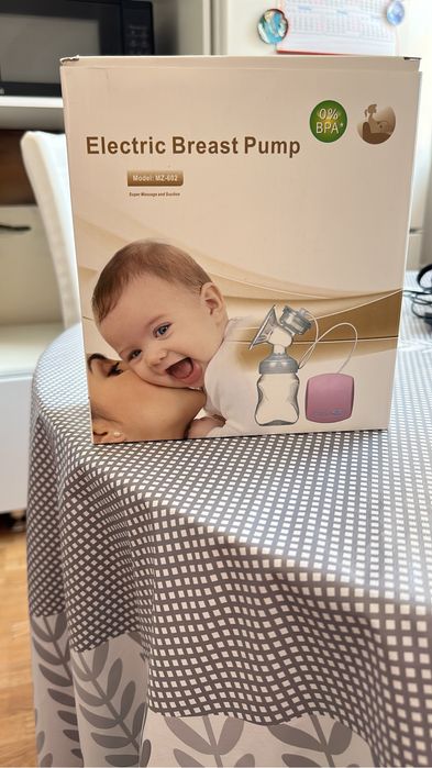 Продам молокоотсос автоматический