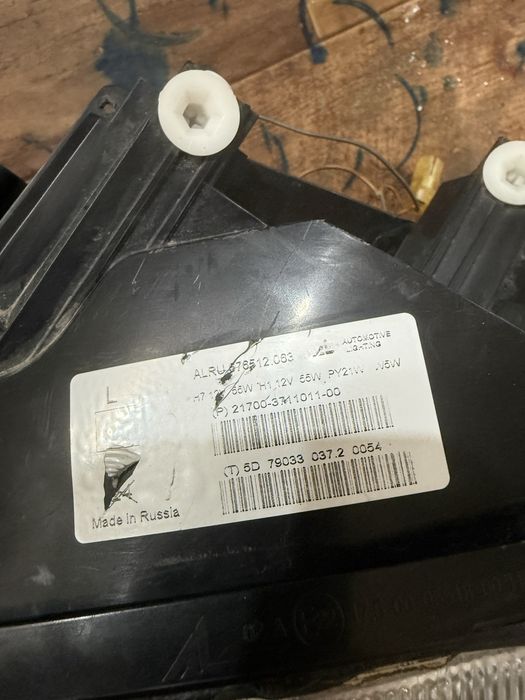 Фара приора 1 левая оригинал бош