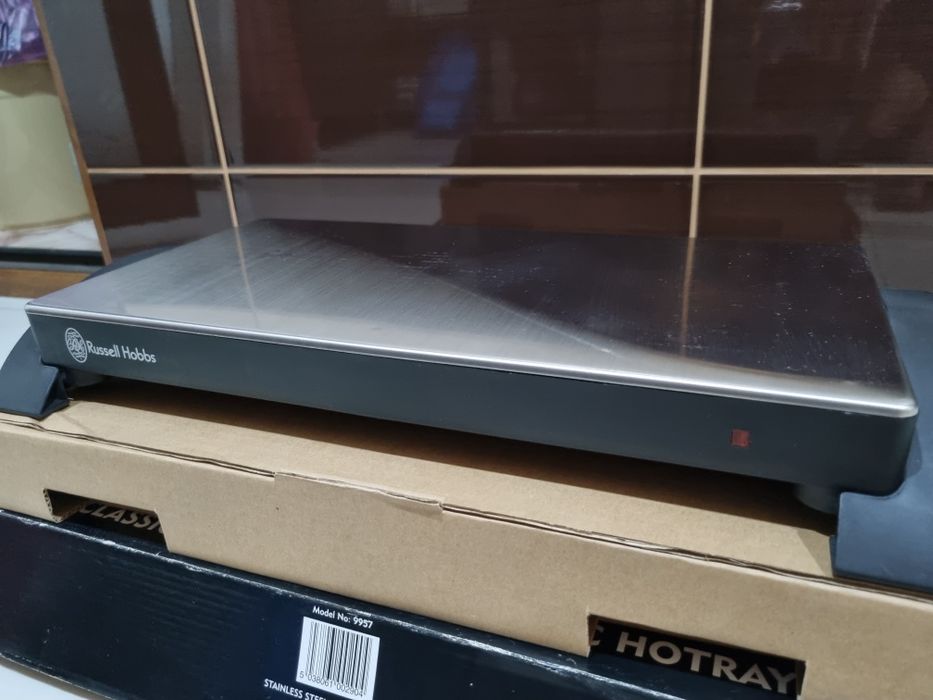 Tava incalzire mancare fără fir Russel Hobbs inox