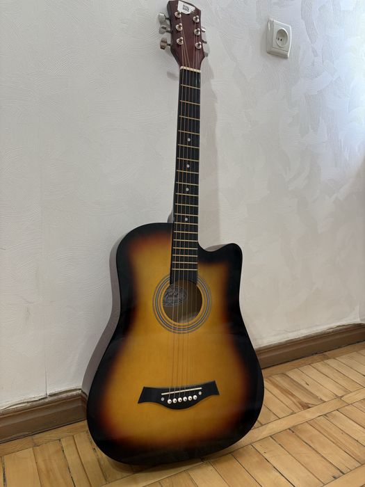 Getara acustik yangi sotiladi 400 000 ming kelishamiz