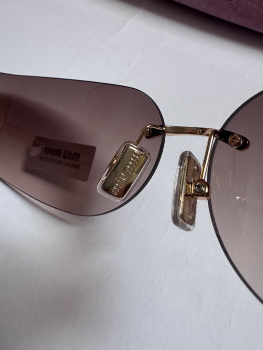 Ochelari de soare Miu Miu MUA51S 75-14 110, Noi