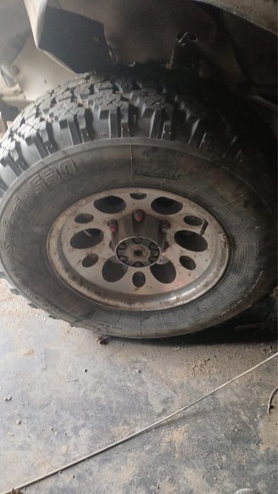 Грязевые шины с дисками на опель фронтера а!