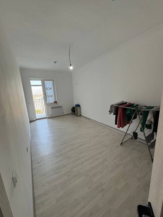 Янги хает туман Хушнуд махалла 2 хона 67 кв