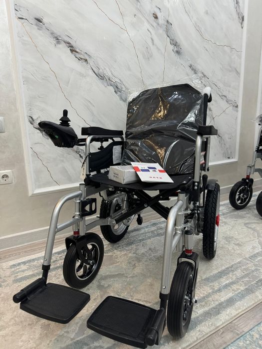 Электрическая инвалидная коляска