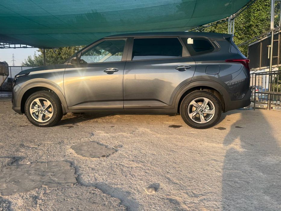 kia carens машина