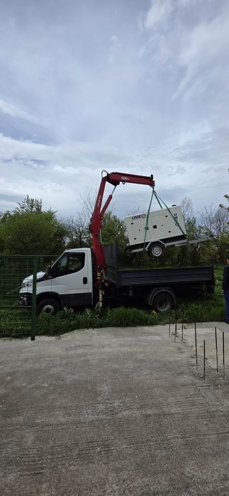 Transport materiale construcții cu macara