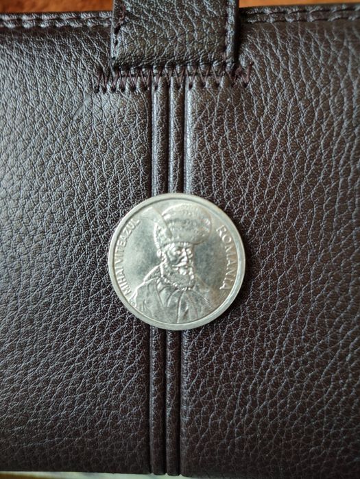 Vand moneda de 100 de lei