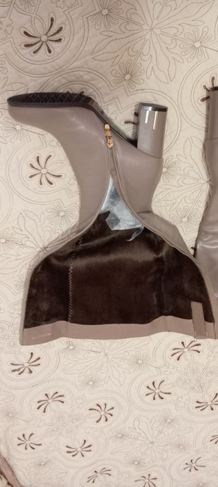 Продам новые сапоги осень-весна .