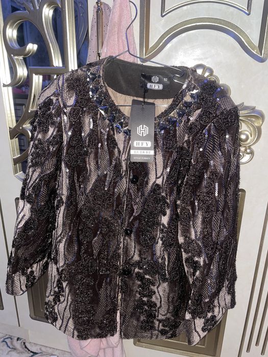 Yangi kostyum kiymagan