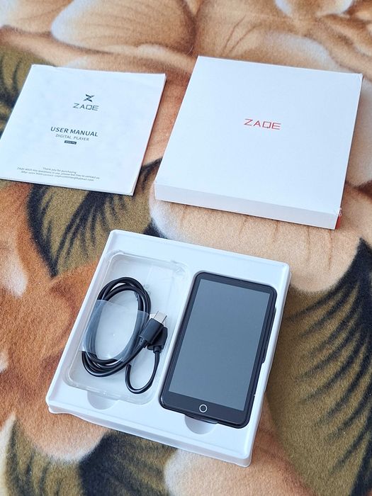 Media player portabil ZAQE -defect-  (modelul ZAQE M505), un dispozitiv MP3/MP4/media player cu ecran tactil și Bluetooth