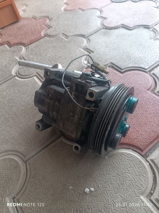 Компрессор кондиционера Мазда 323