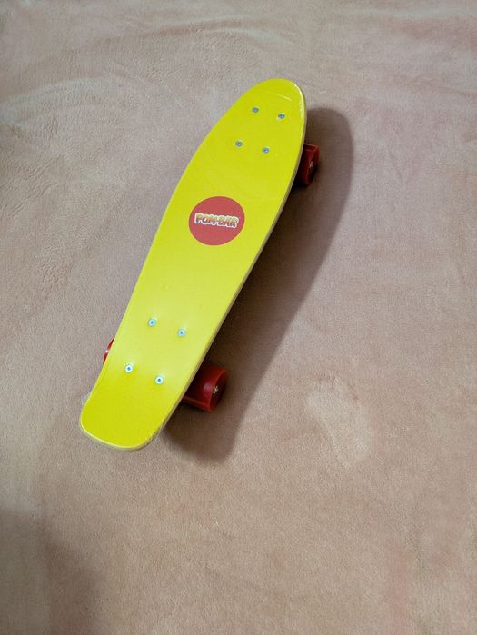 Skateboard nou 57 cm cu desene din filmul Madagascar