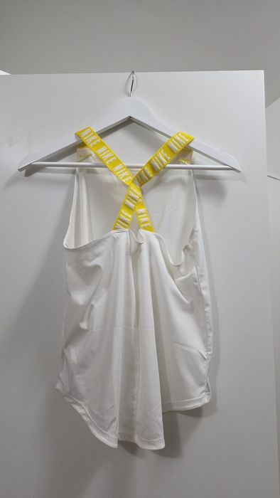 Спортни бюстиета и потници Nike