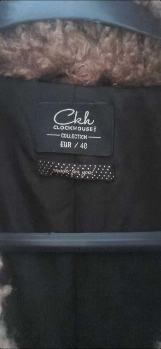 Vestă maro cu buzunare