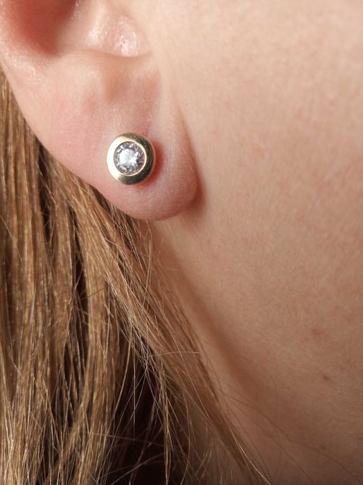 Златни обеци с циркони