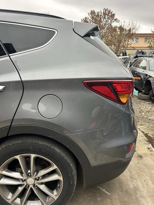 Aripă stanga spate Hyundai Santa Fe 2016