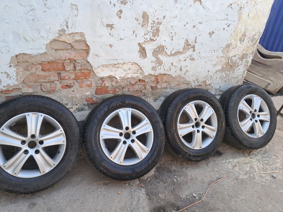 Продам литые диски с резиной