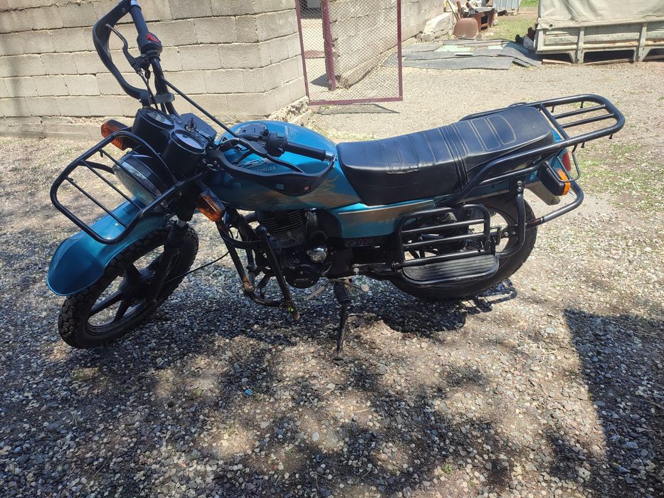 Мотоцикл Сузуки.