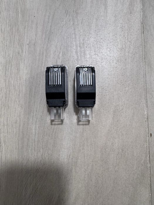 Audi Proiectoare LED Usa Logo Quattro Originale Set Stanga Dreapta