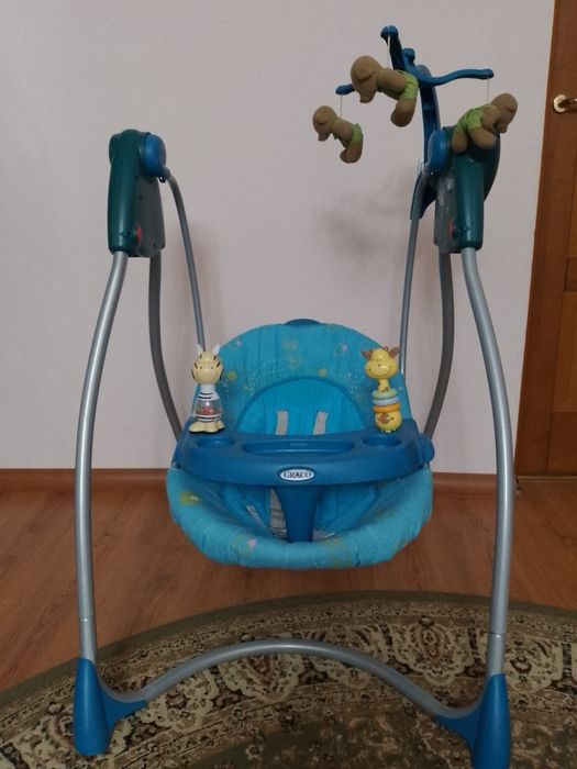 Детские качели с музыкой.