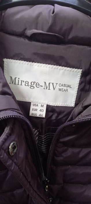 Пуховик женский .