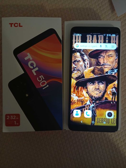 телефон TCL чисто нов