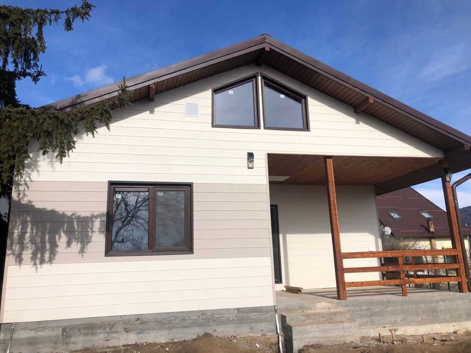 Casa, garaje auto din structura metalica si panou sandwich termoizolat