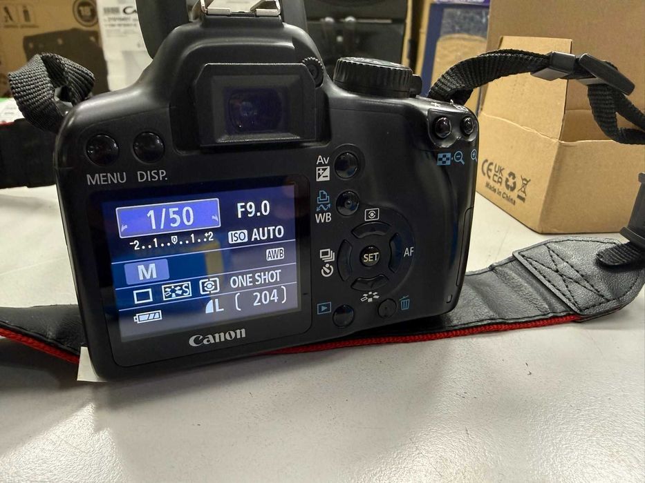 Фотоапарат Canon 1000D