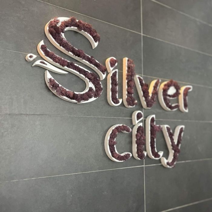 Фирмено лого  от скандинавски мъх