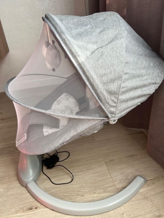 Продам Шезлонг-качеля новый