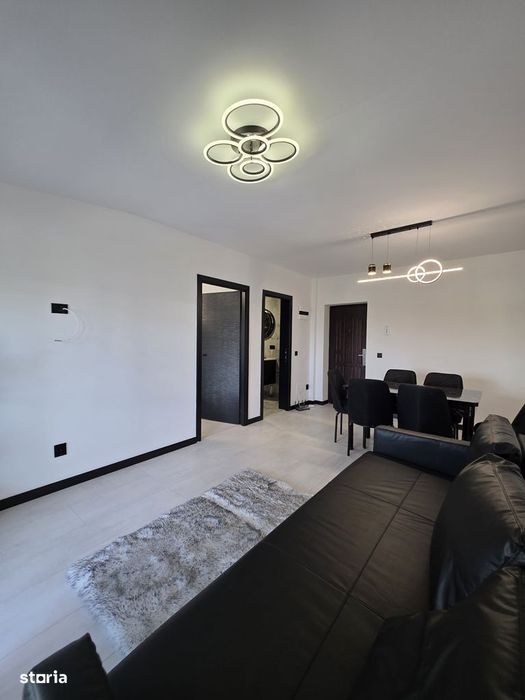 Apartament bloc nou,parcare proprie, mobilat.