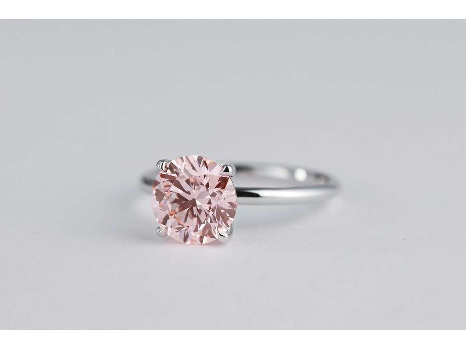 Inel de logodna cu diamant roz