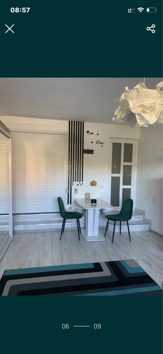 Casa la curte tip garsoniera cu living locuibil