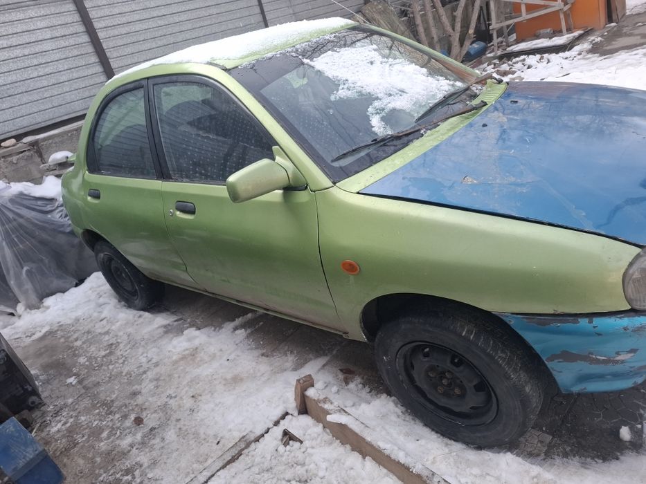 Продам  мазда  121