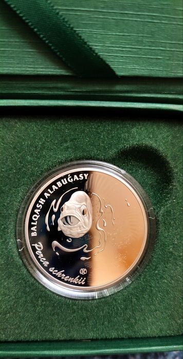 продам монету окунь