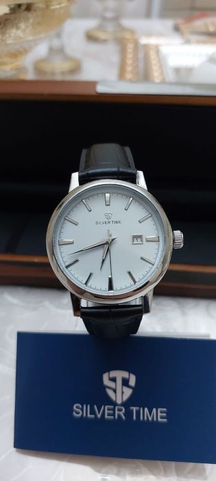 .Серебряные часы