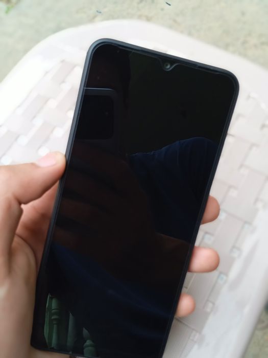 Redmi A1+ 32 Gb li,Qora rang deyarli yengi ideal sastayana