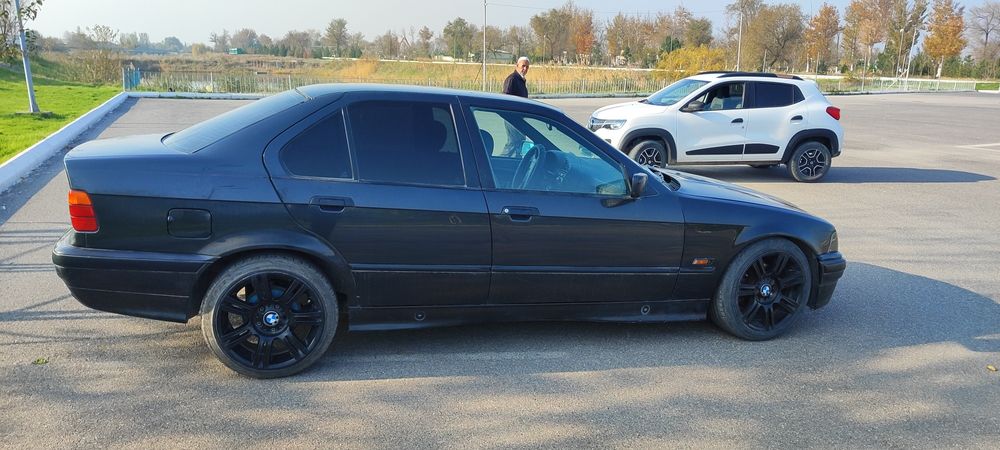 BMW madel 318 holati yahshi