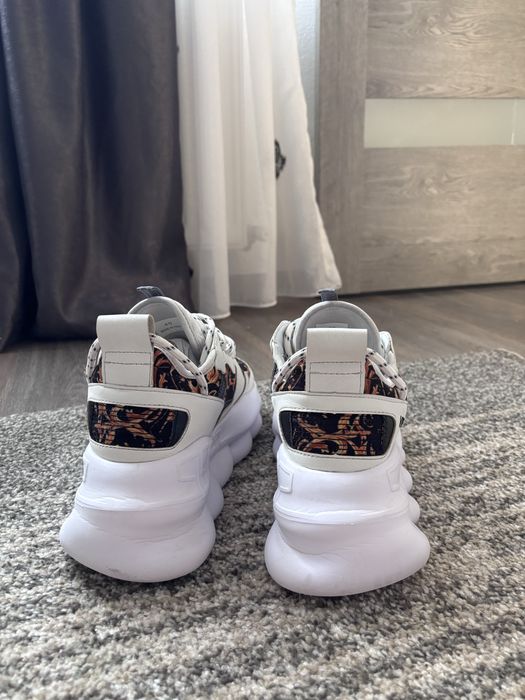 Versace chain reaction