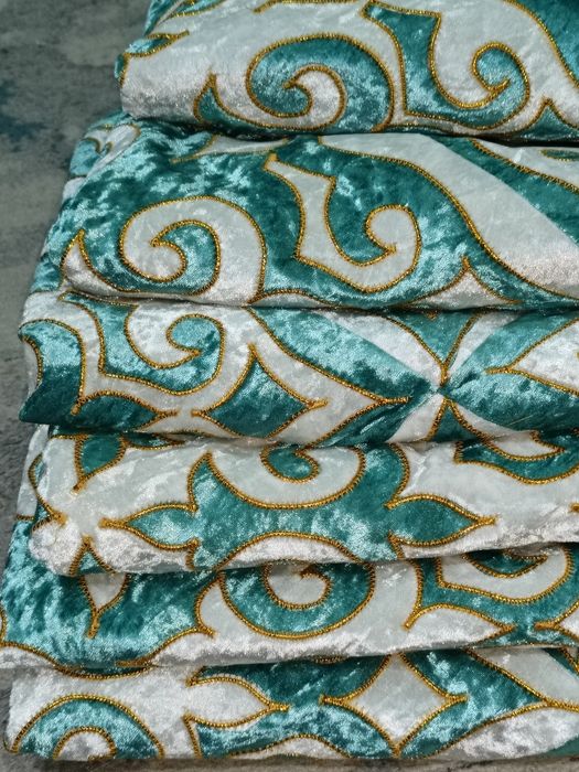 Корпеше каптауга оюмен тигилген