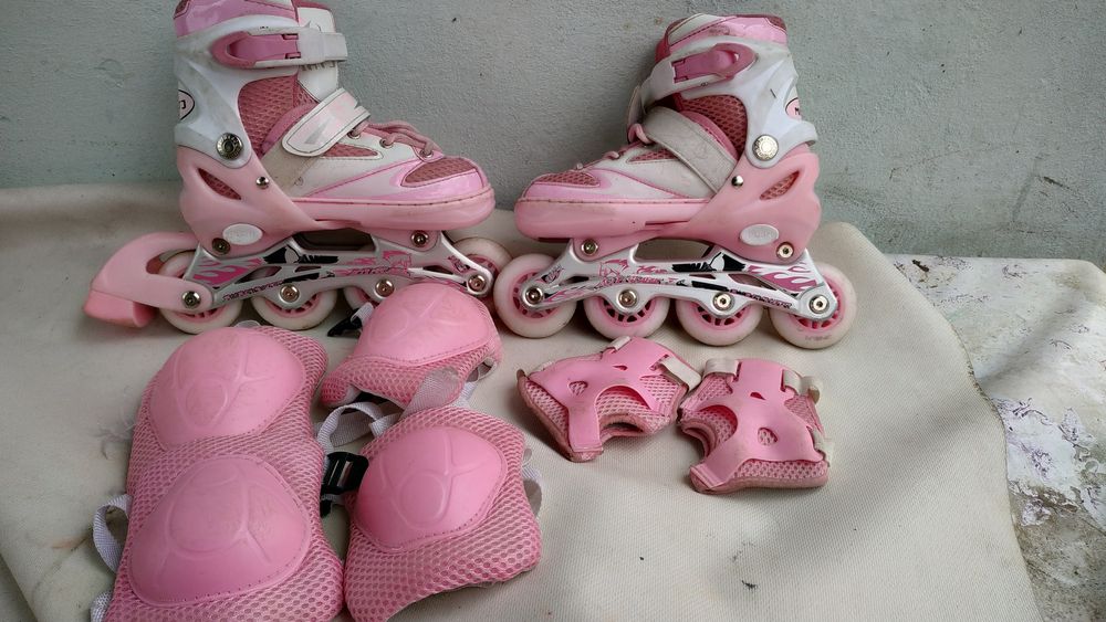 Роликовые коньки